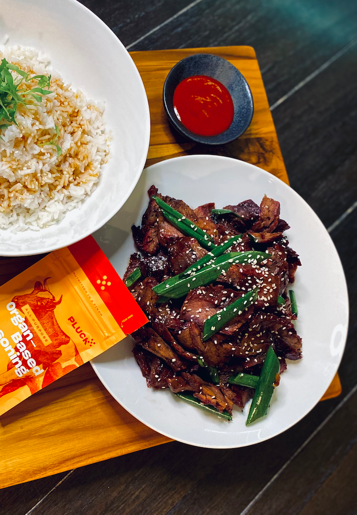 Korean Beef Bulgogi Bowl with Rice and Green Onions