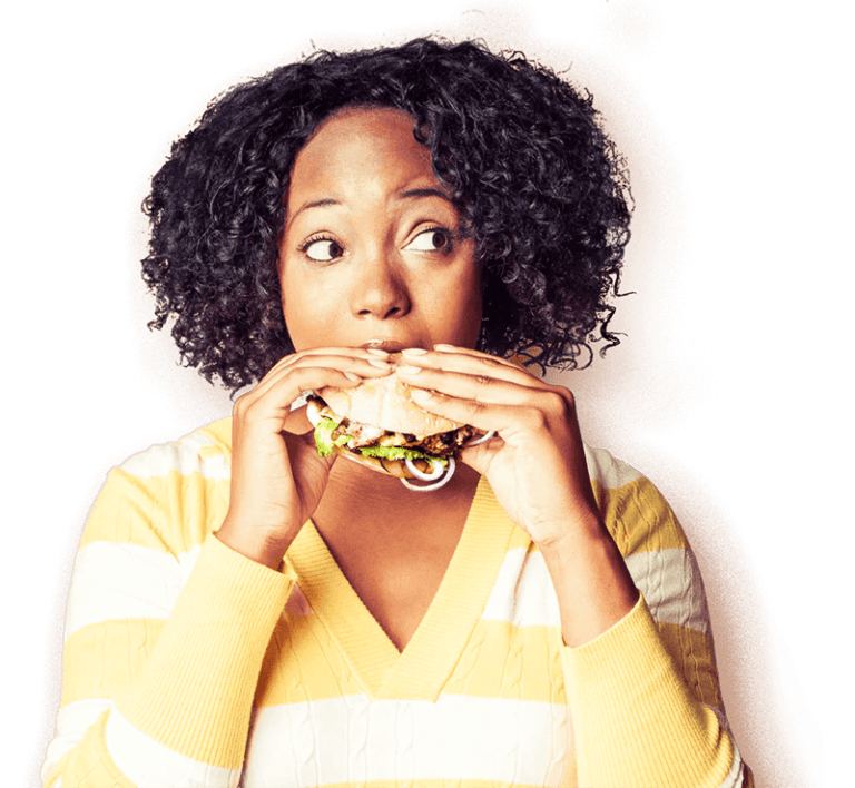 lady eating a burger